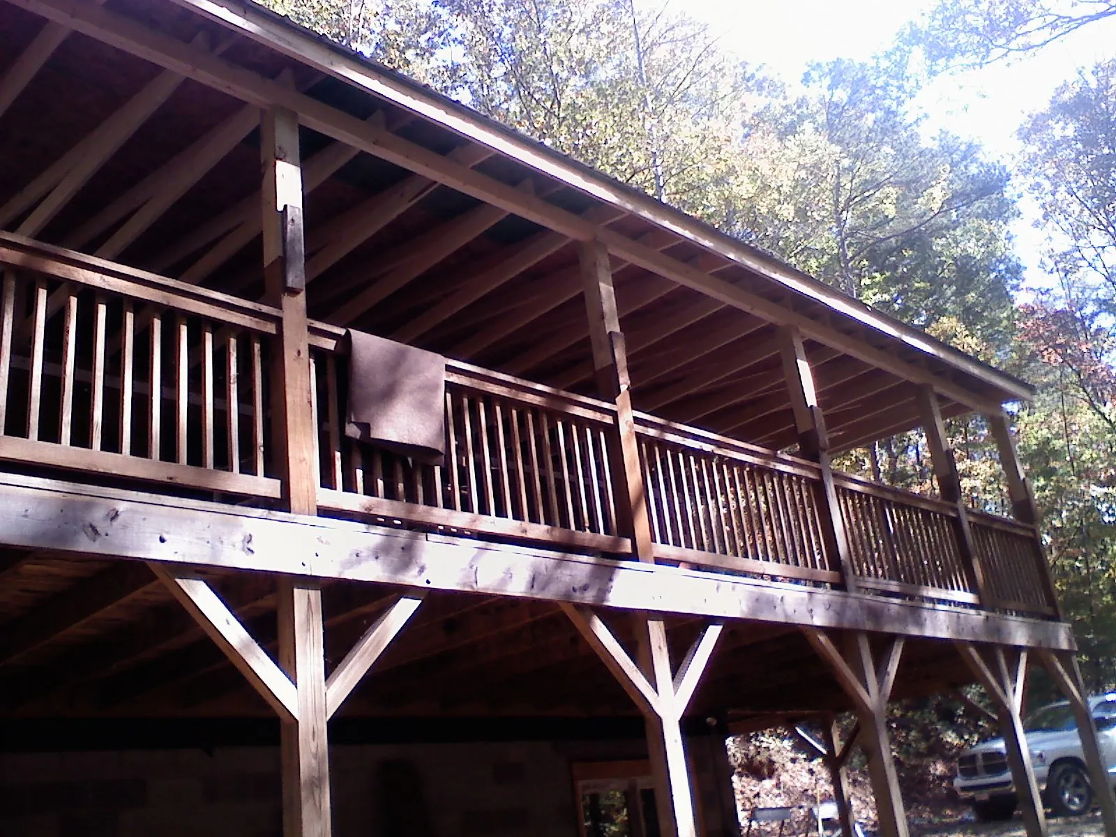 Timber framing under a new elevated porch and deck — Roof Leak Repair in Altair by Roofing Brothers